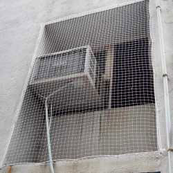 Wire netting placed on the window to prevent pigeon landing